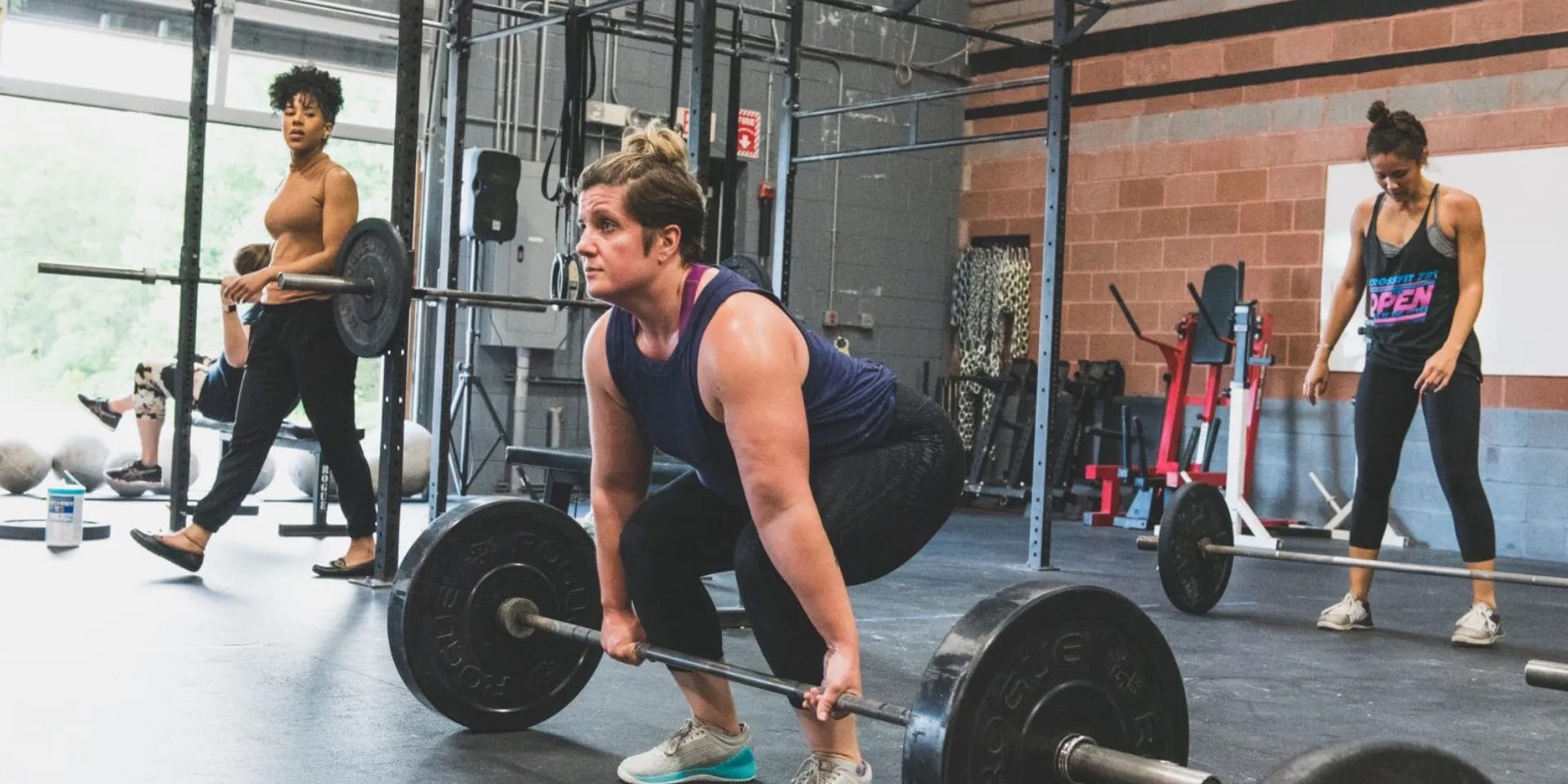 CrossFit 781 Woman Training with Barbell